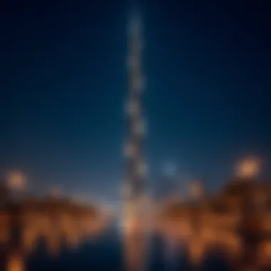 Night view of the Crescent Tower illuminated, reflecting its significance in Dubai's nightlife.