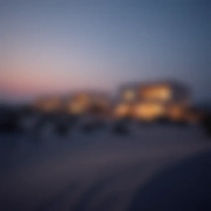 A tranquil evening scene featuring illuminated dune homes reflecting the lifestyle benefits of residing near sand dunes.